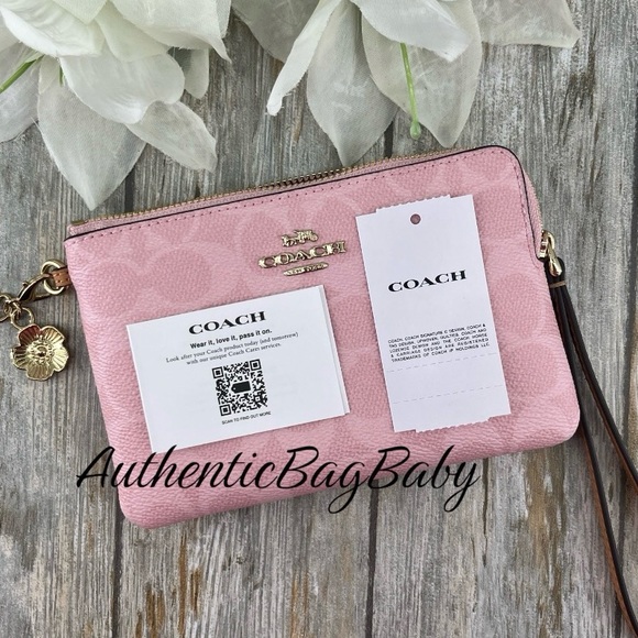 Coach Corner Zip Wristlet In Signature Canvas With Charms Wallet Purse